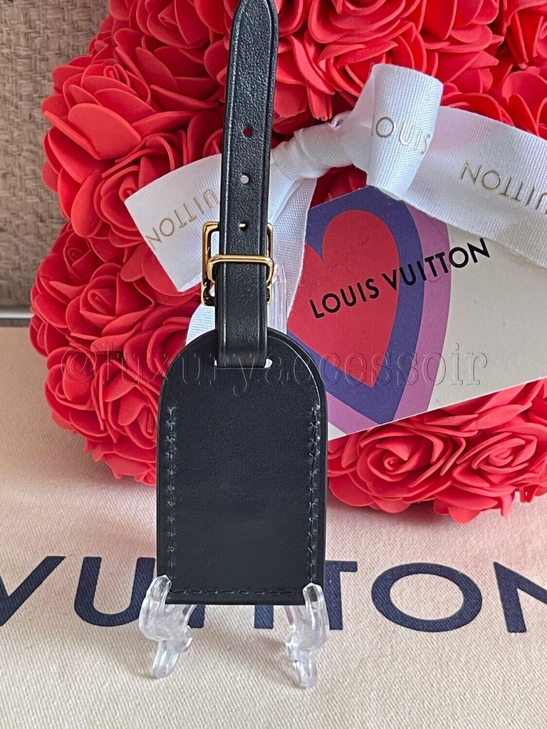 Louis vuitton luggage tag black top